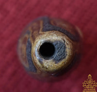 Ancien Dzi tibétain sacré à neuf yeux La Magie du Bouddha.