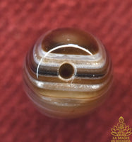 Perle Dzi en agate tibétaine rayée naturelle La Magie du Bouddha.