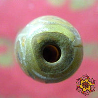 Perle sacrée Tibétaine Dzi à neuf yeux. La Magie du Bouddha.