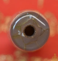 Dzi tibétain à dix yeux en agate translucide – Perle rare de prospérité et d’éveil