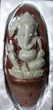 Ganesh sculpté dans un Shiva Lingam.