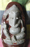Ganesh sculpté dans un Shiva Lingam.