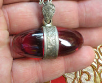 Pendentif unique Shiva Lingam en cristal rouge des Nāgas – Monture argent