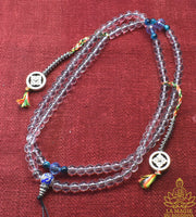 📿 Mala tibétain artisanal en cristal et oeil de faucon La Magie du Bouddha.