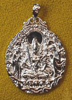 Pendentif de Manjushri en métal argenté – Sagesse transcendante La Magie du Bouddha.