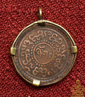 Pièce tibétaine ancienne 1 Sho du Tibet libre montée en pendentif La Magie du Bouddha.