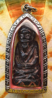🐯 Amulette Lersi ancienne en résine végétale noire