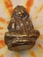 Very old bronze amulet of Phra Sangkajai (the Buddha of fortune)