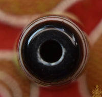 Perle sacrée tibétaine Dzi ancienne – Symbole de l’infini