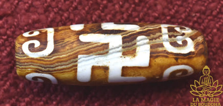 Perle Dzi tibétaine Svastika Tradition Bönpo en agate La Magie du Bouddha.