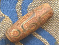 Perle sacrée tibétaine Dzi à neuf yeux – Pièce ancienne authentique La Magie du Bouddha.