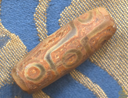 Perle sacrée tibétaine Dzi à neuf yeux – Pièce ancienne authentique La Magie du Bouddha.