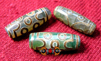 Perles Tibétaines Dzi à sept yeux verts. La Magie du Bouddha.