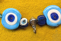 Unique necklace for amulet in blue eye beads from Nepal