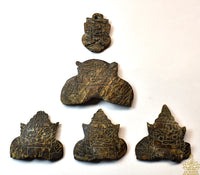 Amulettes protectrices Phra Rahu en coquille de noix de coco (Wat Sri Sathong)