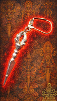 Boucle d’oreille tibétaine phurba en métal argenté La Magie du Bouddha.