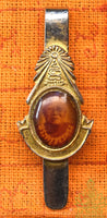 Antique tie pin with a portrait of the venerable Thai Phra Khru Thammathon