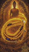 Tibetan mala prayer beads in yellow glass with Chenrezig mantra and Ye Ming Zhu sacred bead