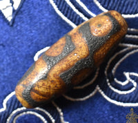 Perle sacrée tibétaine ancienne Dzi à neuf yeux – Prospérité et Pouvoir spirituel La Magie du Bouddha.