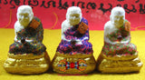 Statuettes du Très Vénérable LP Dooh du Wat Sakai (avec reliques Phratat multicolores).