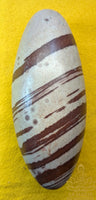 Sacred Shiva Lingam in natural stone with brown bands