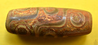 Perle sacrée tibétaine Dzi à neuf yeux – Pièce ancienne authentique La Magie du Bouddha.