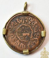 Ancienne monnaie tibétaine de 5 Skar montée en pendentif La Magie du Bouddha.