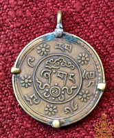 Pendentif pièce tibétaine ancienne de 1 Sho au Lion des Neiges La Magie du Bouddha.