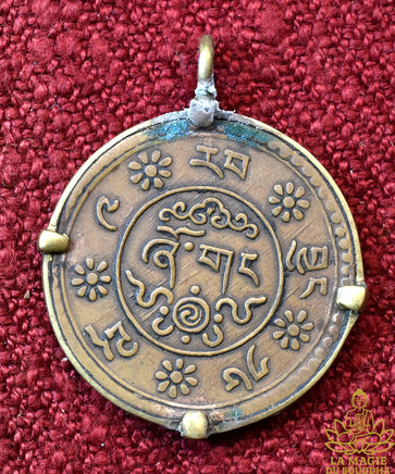 Pendentif pièce tibétaine ancienne de 1 Sho au Lion des Neiges La Magie du Bouddha.