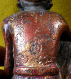 Statuette ancienne rouge et or d'un ermite Lersi.