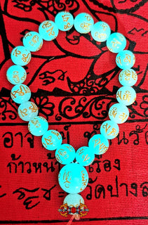 Chapelet Bouddhiste de poignet en pierre Ye Ming Zhu gravée de mantra. La Magie du Bouddha.