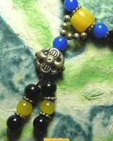Tibetan glass mala - black / blue / white colors. 