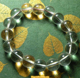 Mala de poignet / bracelet - perles en verre translucide