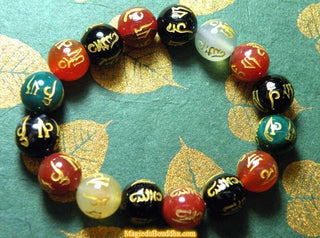 Mala de poignet mantra en pierres fines (quartz, agate, oeil de tigre...). magiedubouddha