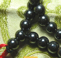 Tibetan Buddhist rosary made of magnetite (magnet). 