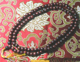 Chapelets Bouddhistes Mala Tibétain en bois - couleurs variées. La Magie du Bouddha.