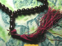 Tibetan Mala in dark red "ruby color" glass. 