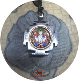Amulette tibétaine de chenrézi.
