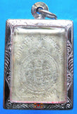 Amulette thai dharmachakra.