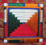 Amulette tibétaine pour protéger les maisons.
