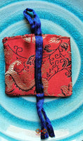 Amulette tibétaine du stoupa d'atisha.
