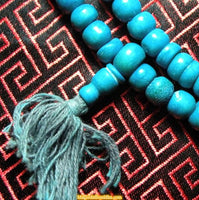 Mala made of dyed yak bone: coral or turquoise colors 