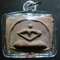 Amulette Thai ancienne Bouddha stylisé.
