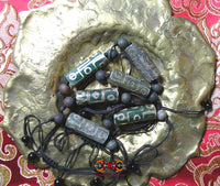 Bracelet Tibétain avec Dzi à neuf yeux.