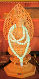 Chapelet fluorescent du bouddha ksitigarbha.