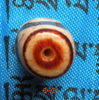 Petit Dzi Tibétain avec motif à rayures. magiedubouddha