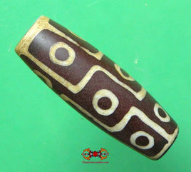 Small Tibetan Dzi with 9 eyes. 