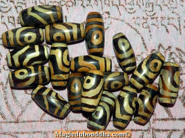 Small Tibetan Dzi with two eyes. 