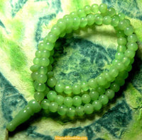 Petit mala en verre couleur jade