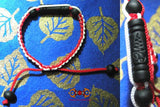 Bracelets Sai Sin d'invulnérabilité avec perles en minerai de Lek Namphi.